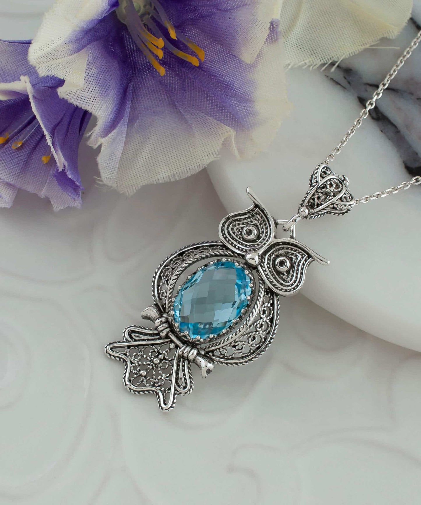 Filigree Art Owl Figured Blue Topaz Pendant