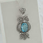 Filigree Art Owl Figured Blue Topaz Pendant