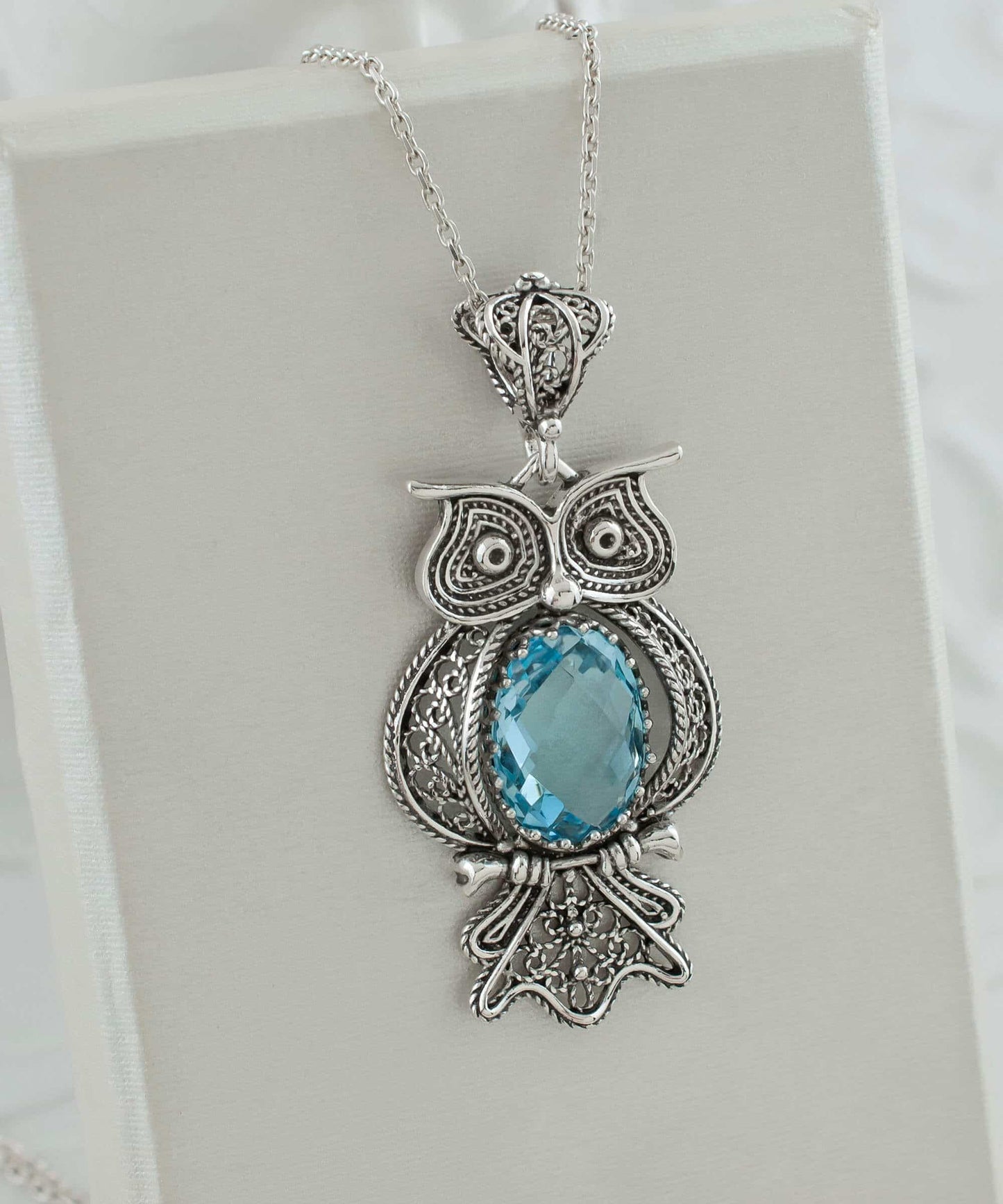 Filigree Art Owl Figured Blue Topaz Pendant