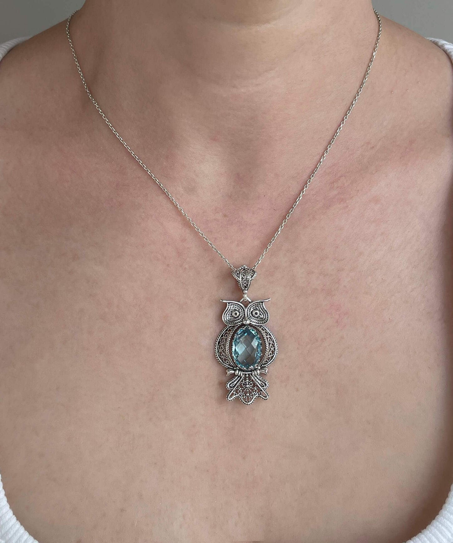 Filigree Art Owl Figured Blue Topaz Pendant